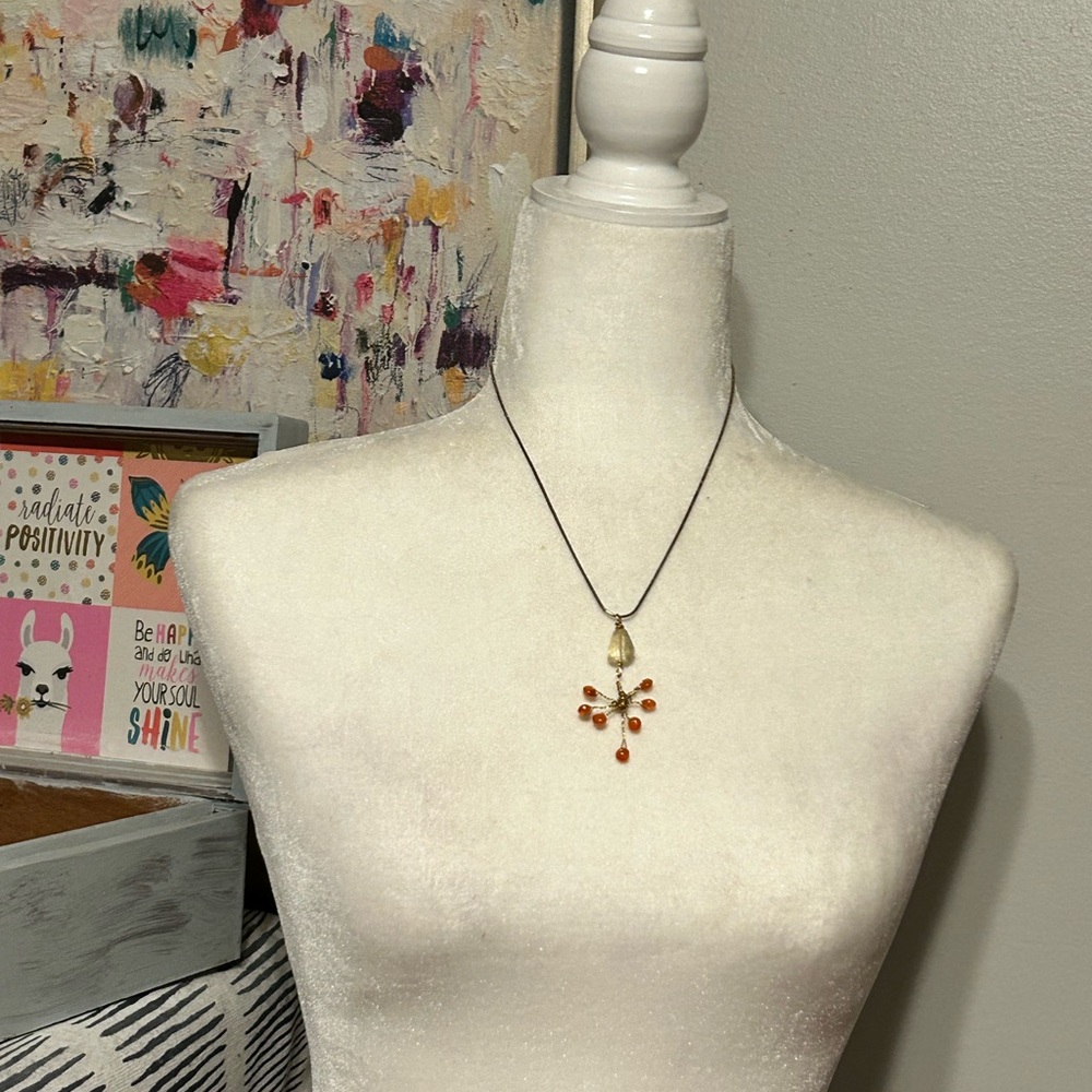 Oxidized Sterling silver hand wrapped faceted carnelian stone pendant necklace.